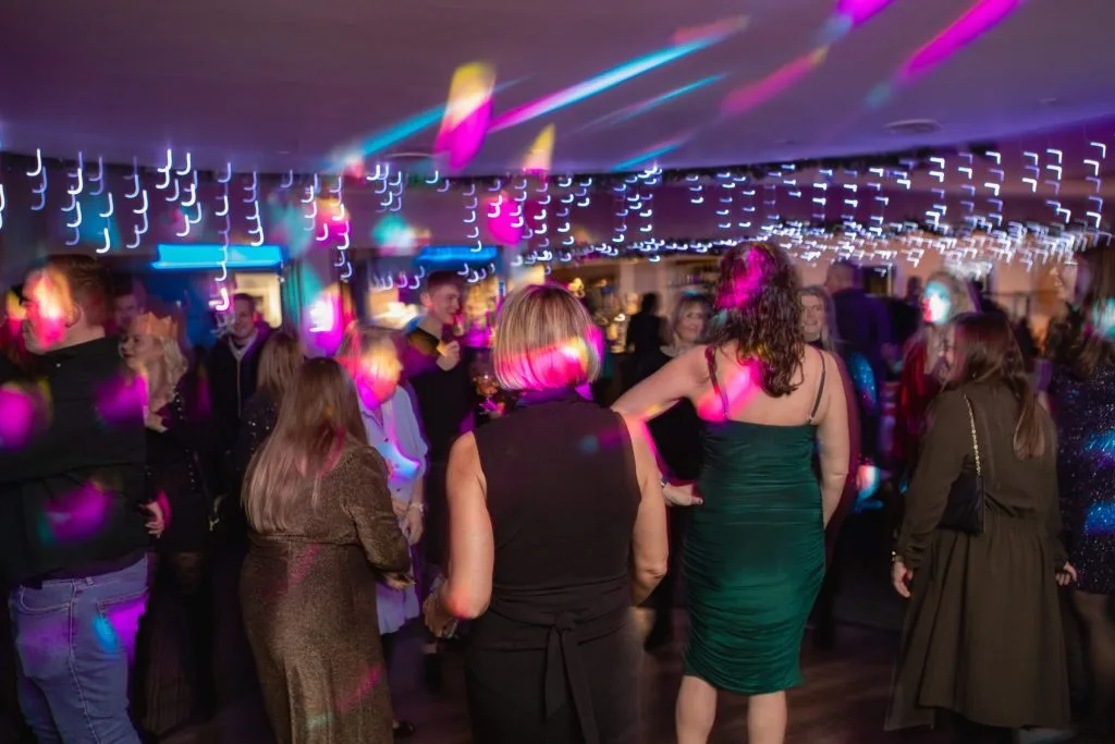People dancing at a christmas party in dartford