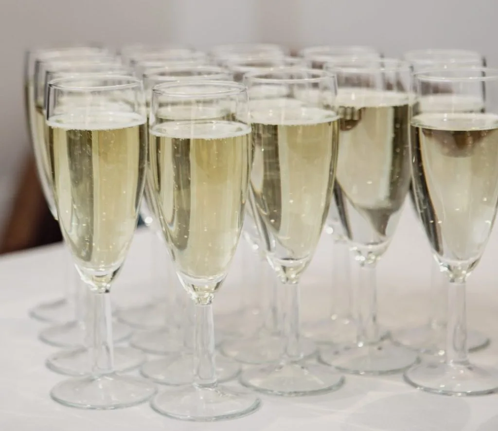 Arrival drinks of prosecco at party in Dartford