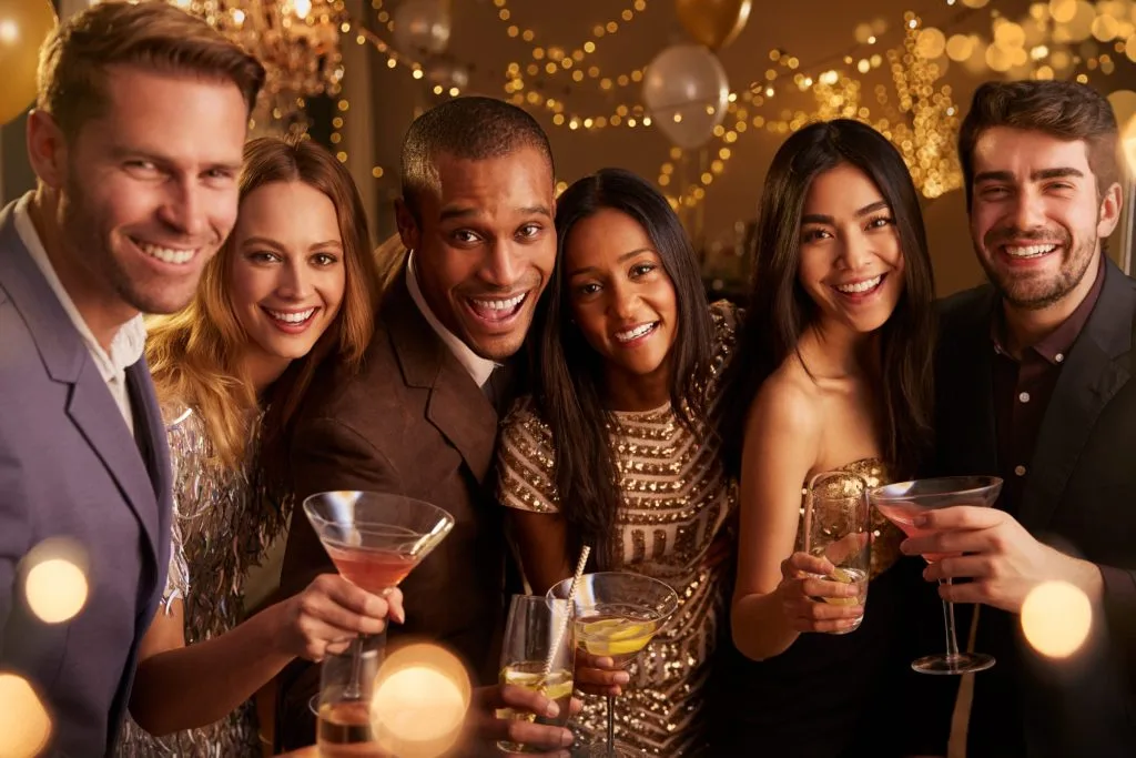 Group celebrating a corporate party in dartford with drinks