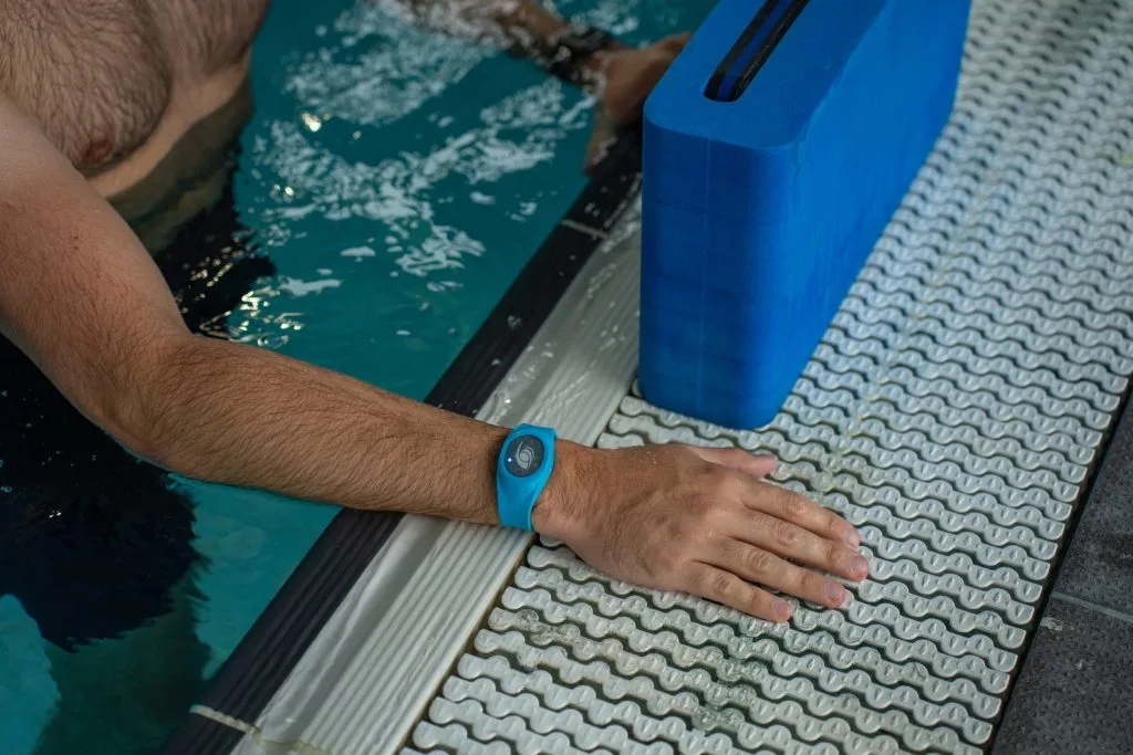 swimmer activating swim tag tracking at swimming pool in dartford