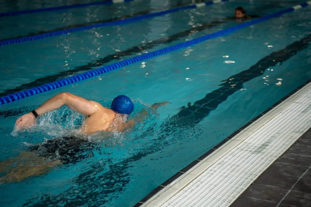 Man swimming in pool lane in swimming pool in dartford