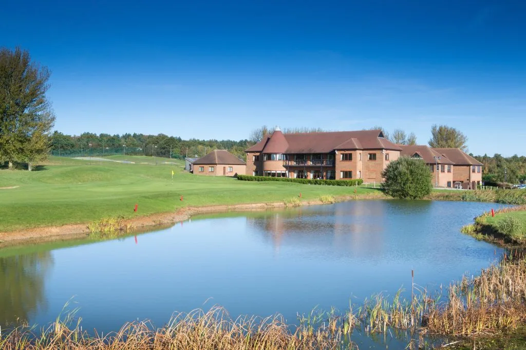 Outside view of Birchwood Park with lake